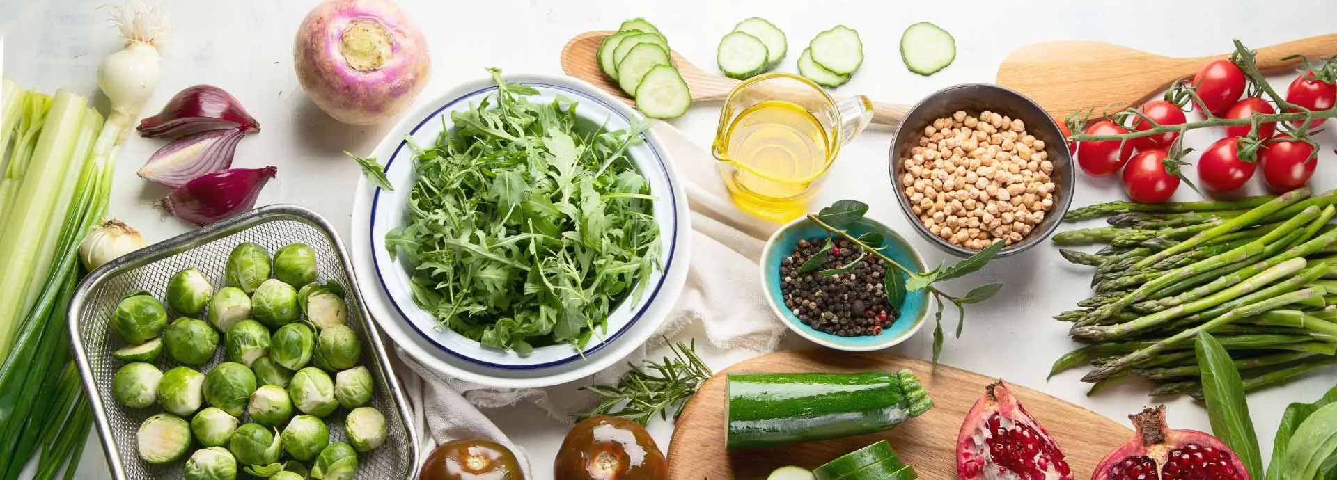 Colorful array of health-promoting vegetables, beans and olive oil